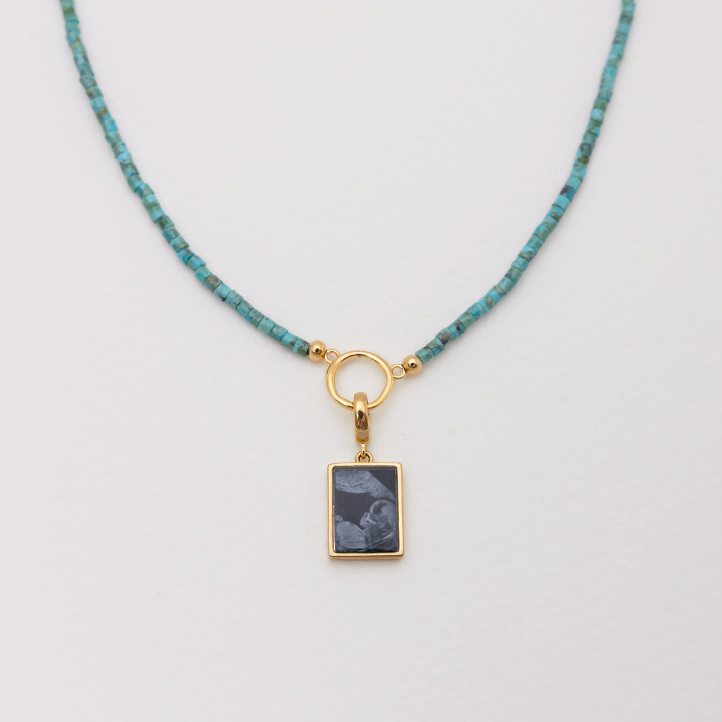 Raiz Alba Turquoise Beaded Necklace with Circle Gold - Front View with Ultrasound Custom Pendant